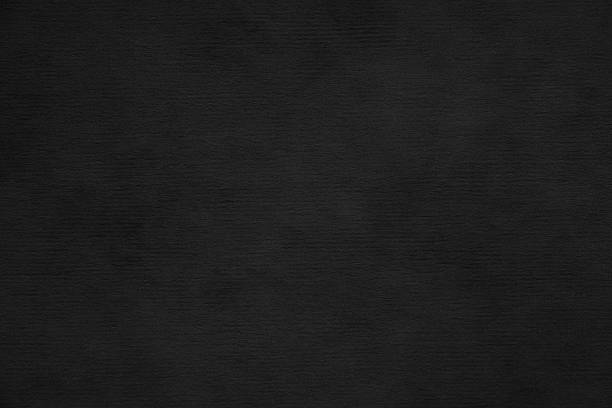 istock Rugged wrinkled black paper background 628400642