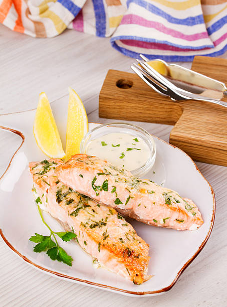 istock Baked salmon with parmesan and herbs 628400782