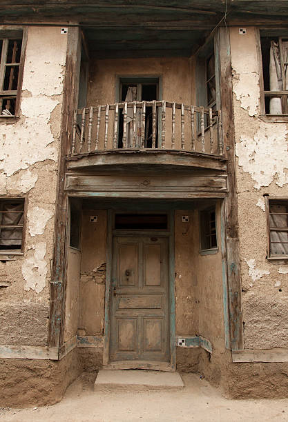 istock old house building outer cover, ruin Brown house 628408426