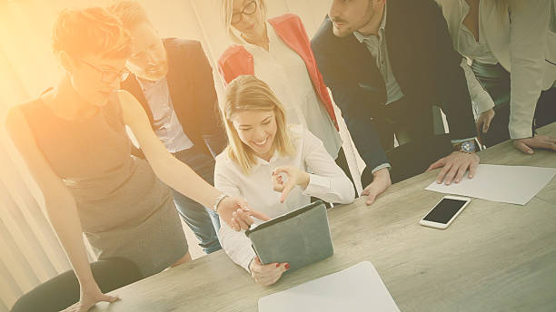 istock Group of business people in office. 628409092