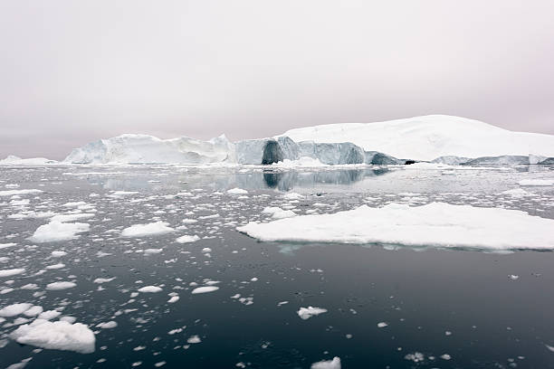 istock Icebergs on frozen arctic ocean in Greenland 628409206