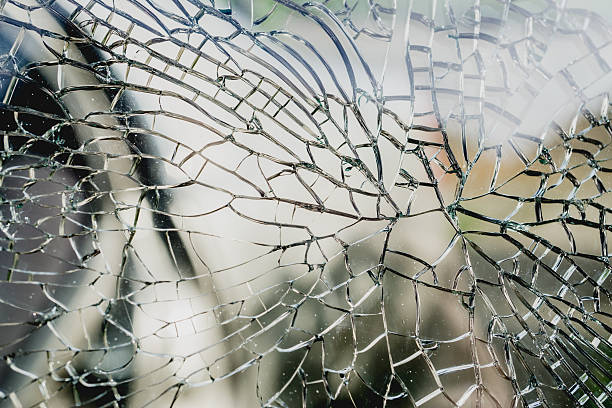istock Abstract background of cracked and broken glass 628420756