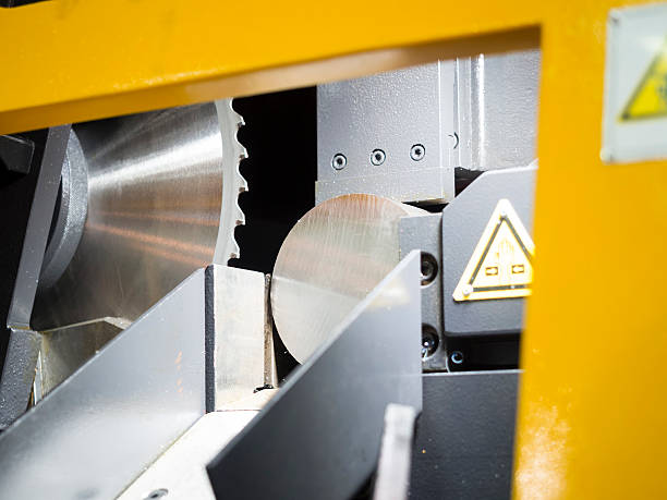 istock band saw cutting steel bar 628438788