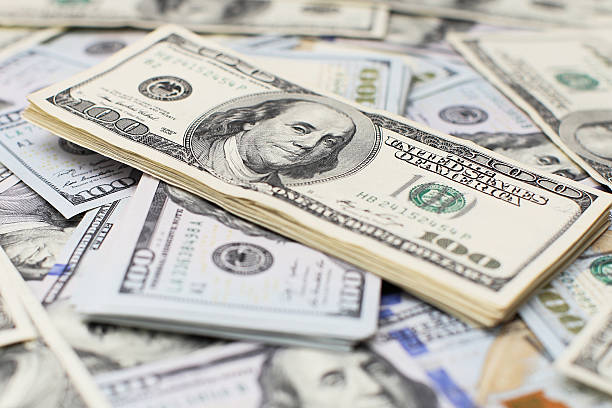 istock Heap of one hundred dollar 628440568
