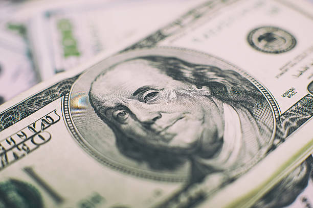 istock Heap of one hundred dollar 628440636