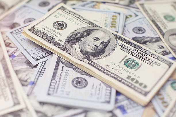 istock Heap of one hundred dollar 628440808