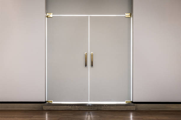 istock Modern Doors White Outline Bright Shining Indoors Closed Hidden 628440872