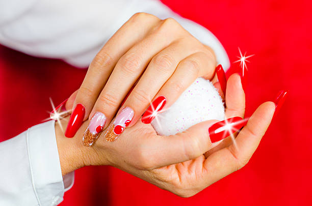 istock red nails decorated for your fantastic Christmas 628452006