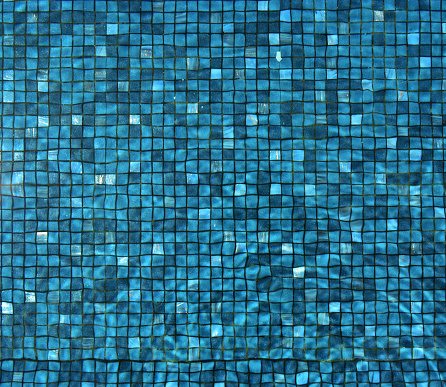 Swimming pool floor blue tiles 
