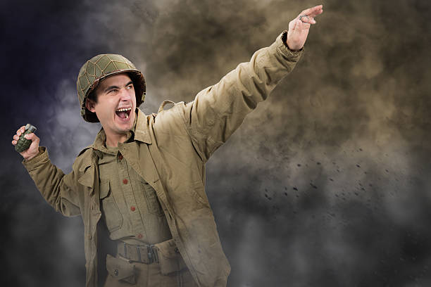 istock American soldier ww2 throwing a grenade 628453864