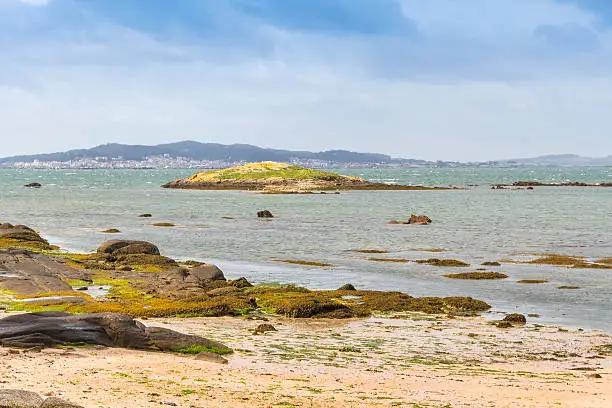 Photo of Rocky islet on Patinhas beach