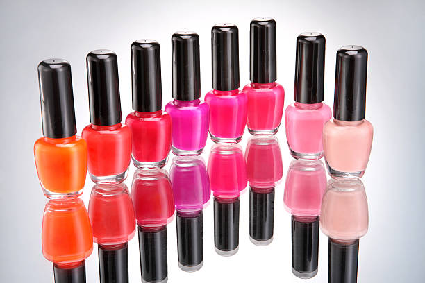 istock Bottles of nail polish on grey background 628454812