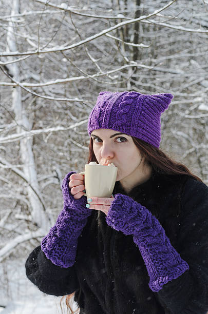 istock Long-haired brunette girl walking in a winter park 628455166