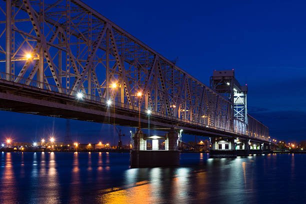 istock Railroad bridge in Arkhangelsk, Russia at night 628455380