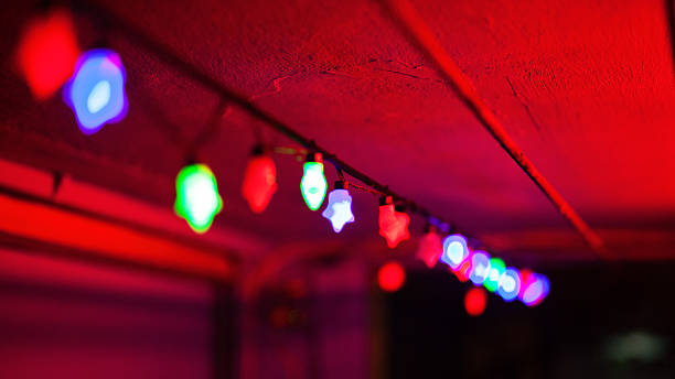 istock Small lamps outside of karaoke bar 628462558