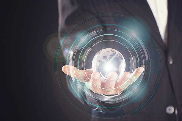 istock holding a glowing earth globe in his hands 628462860