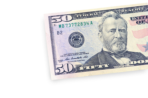 Close up of  fifty dollar isolated on white background. This has clipping path.