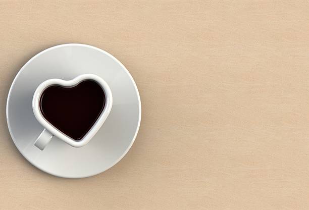 kaffeetasse form herz auf sandstein tisch - isolated on white breakfast cafe office stock-fotos und bilder