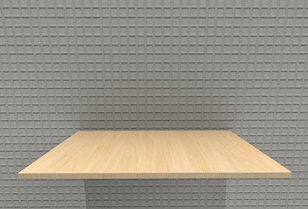 istock Empty top wood shelves and stone wall background 628464176