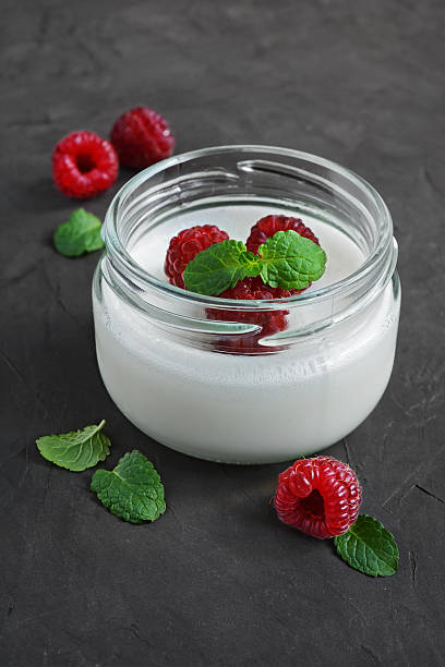 istock Delicious creamy mousse with fresh raspberries 628471250