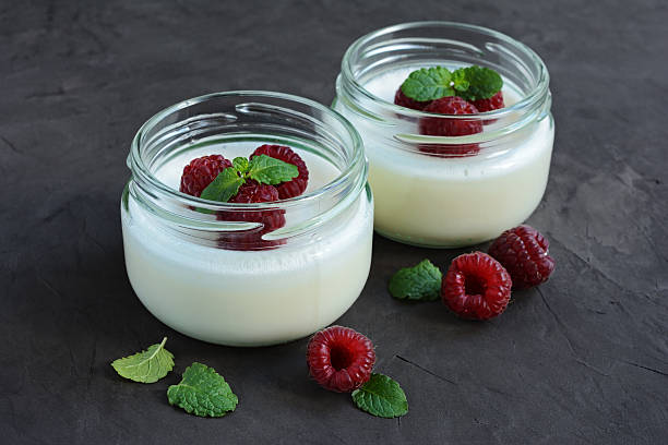 istock Delicious creamy mousse with fresh raspberries 628471306