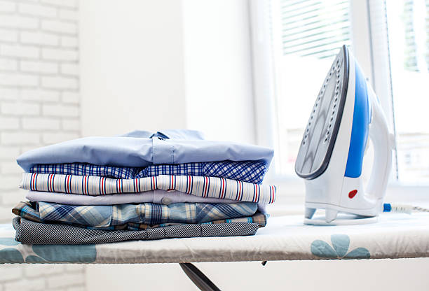 ferro elettrico e camicie - iron laundry cleaning ironing board foto e immagini stock