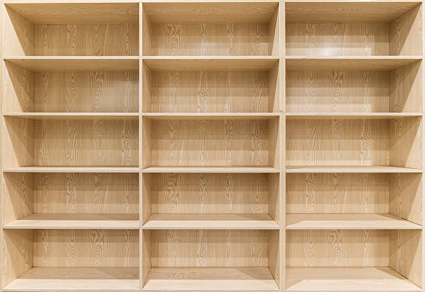 Empty wooden shelf Empty wooden shelf empty bookshelf stock pictures, royalty-free photos & images