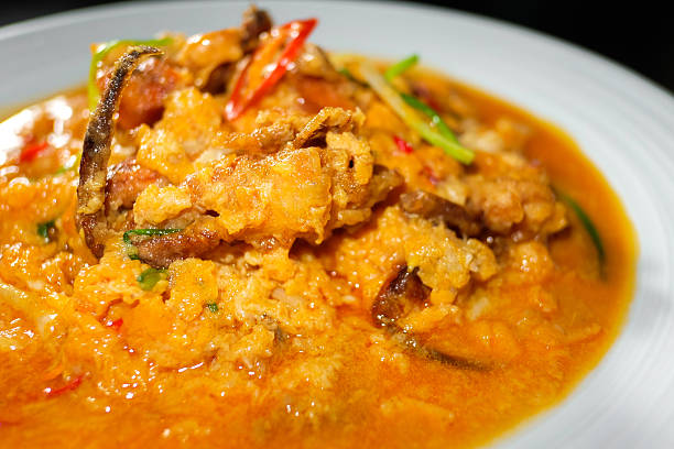 istock Seafood with Yellow curry sauce, sauteed seafood contains fish, 628480660