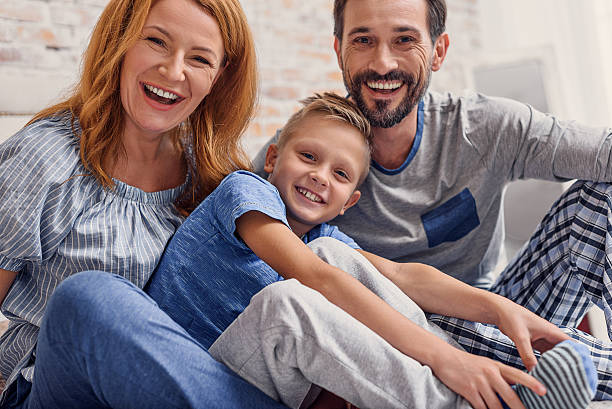 istock Happy family relaxing at home 628480758