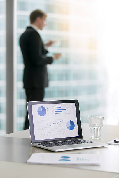 istock Laptop with growing business diagrams 628481538