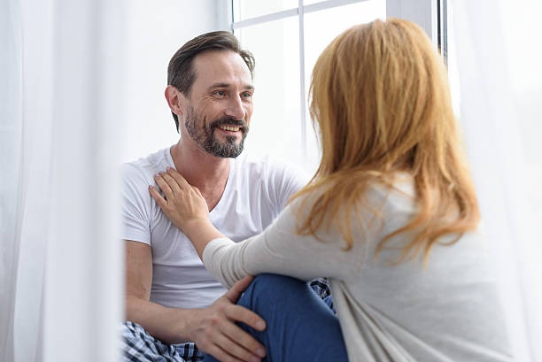 istock Loving senior couple hugging in bedroom 628498136