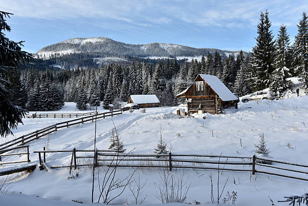 istock Winter landscape with a small wooden hut 628498566
