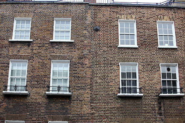 istock Georgian windows architecture on a wall house, London, UK 628505206