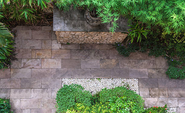 istock Natural flagstone path landscaping in home garden. Top view 628516520