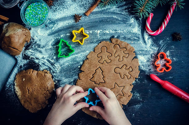 istock Little girl making Christmas cookies 628516742