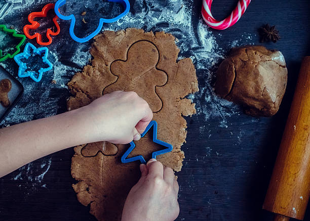 istock Little girl making Christmas cookies 628517096