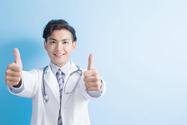 istock Male doctor show thumb up 628525654