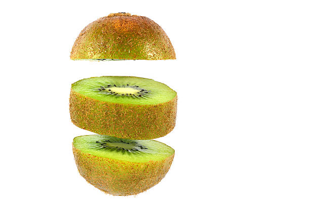 istock Kiwi cut in round pieces isolated on a white background 628528032