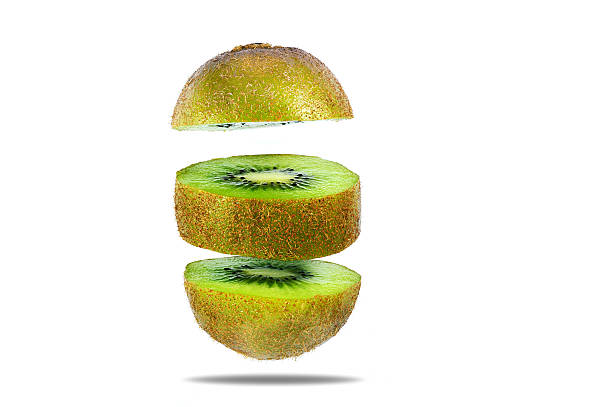 istock Kiwi cut in round pieces floating 628528990