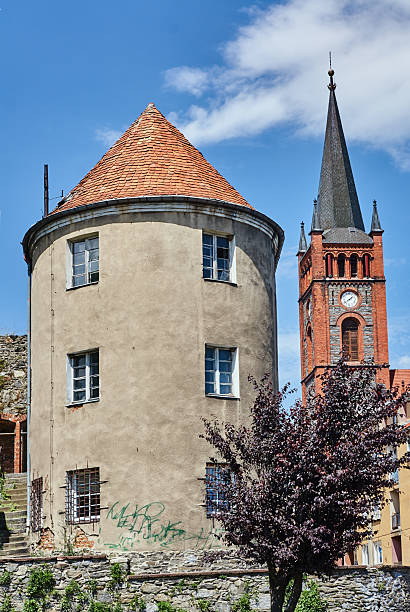 istock Turret and church tower with a clock 628529948