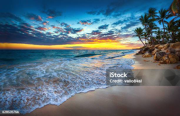 Sunrise Over The Beach Stock Photo - Download Image Now - Caribbean, Caribbean Culture, Caribbean Sea