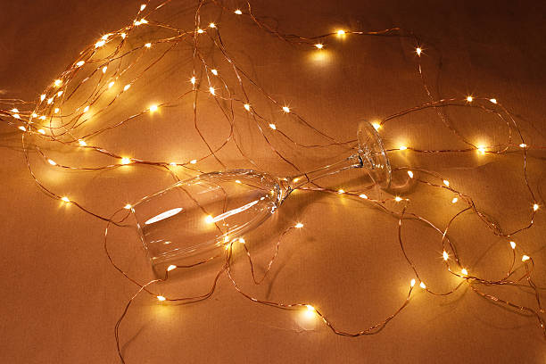 istock Champagne glass and fairy lights 628538912