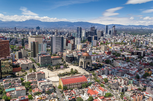 vista aérea de la ciudad de México con monumento a la Revolución photo