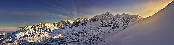 istock Panoramic view of the snow covered Tatra mountain 628542378