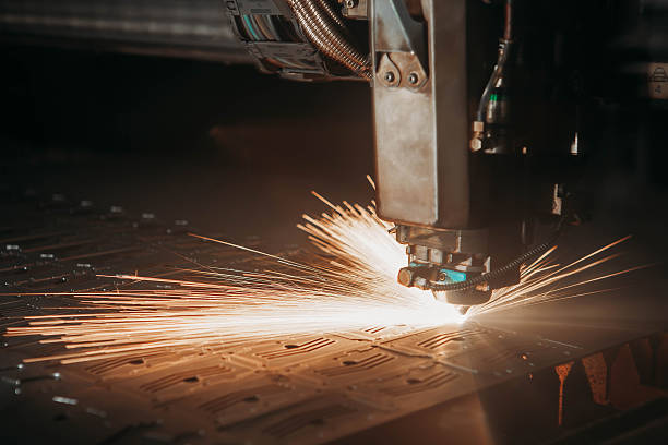 istock Laser cutting machine cuts the metal with sparks 628548350