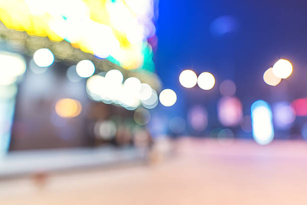 Modern city street at night defocused abstract background
