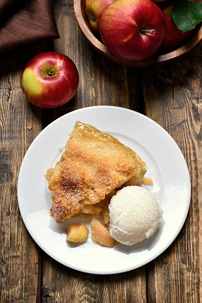 istock Piece of apple pie served with ice cream, fruit baking 628549368