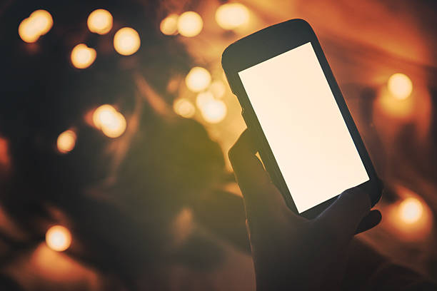 istock Girl using mobile phone in a home atmosphere 628551034
