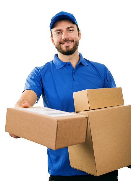 istock delivery service courier giving cardboard shipping box 628551060