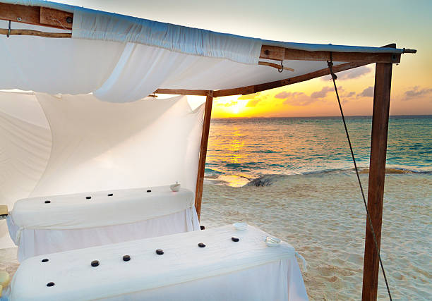 istock Outdoor Spa Beach Massage Service at Sunset 628551412